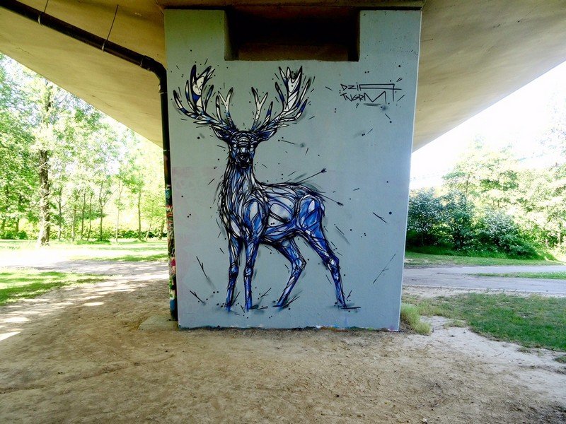 bela-e-animalesca-arte-urbana-de-dzia (18)