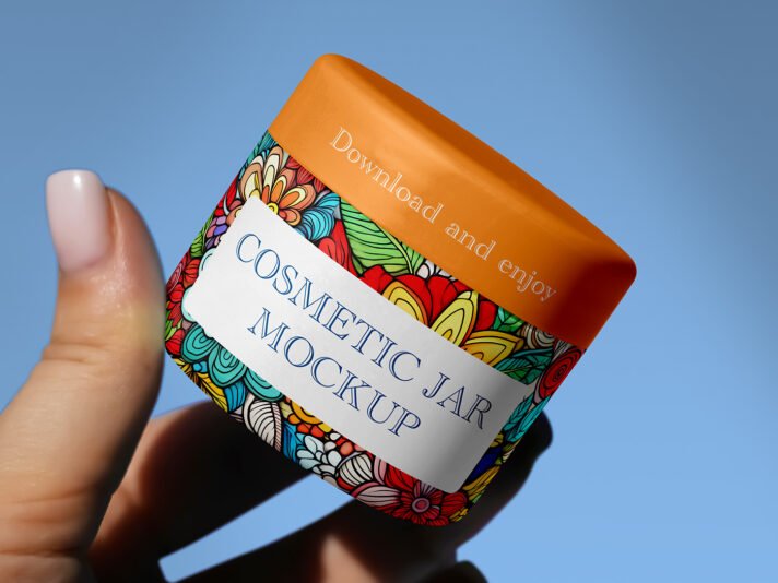 Mockup grátis de pote de cosmético na mão
